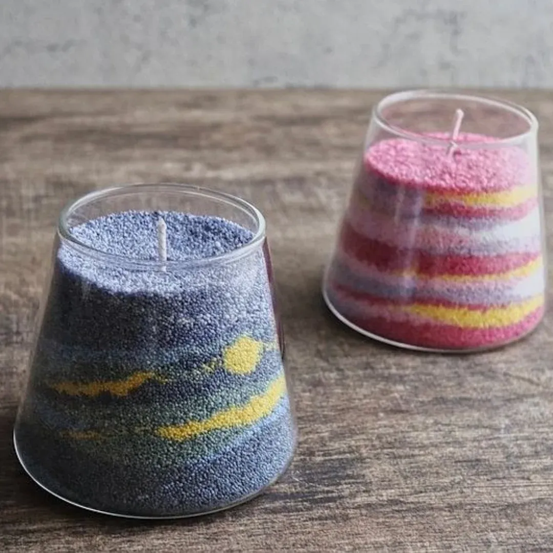 Vela de arena en capas de colores