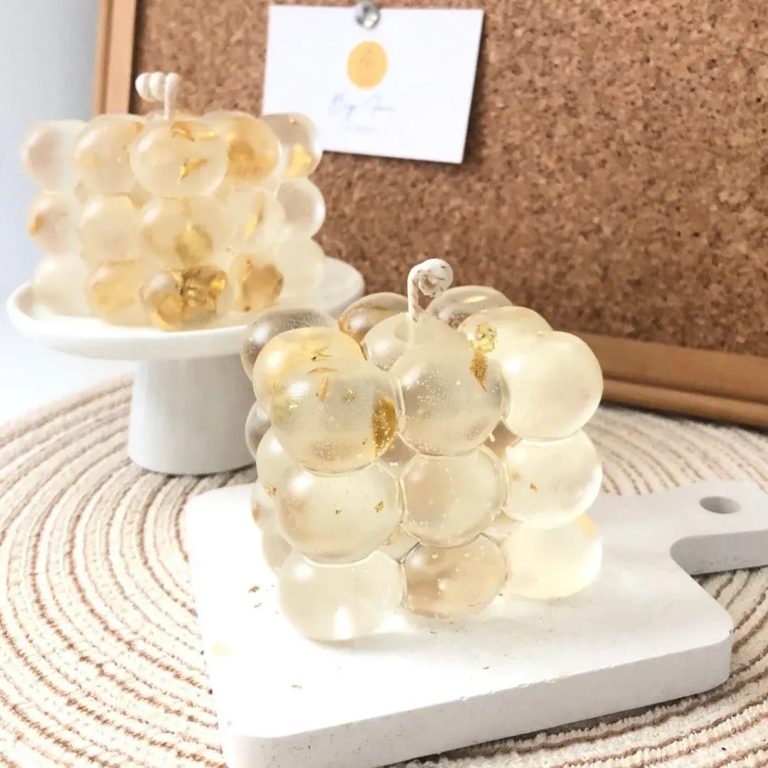 Vela burbuja de gel dorada